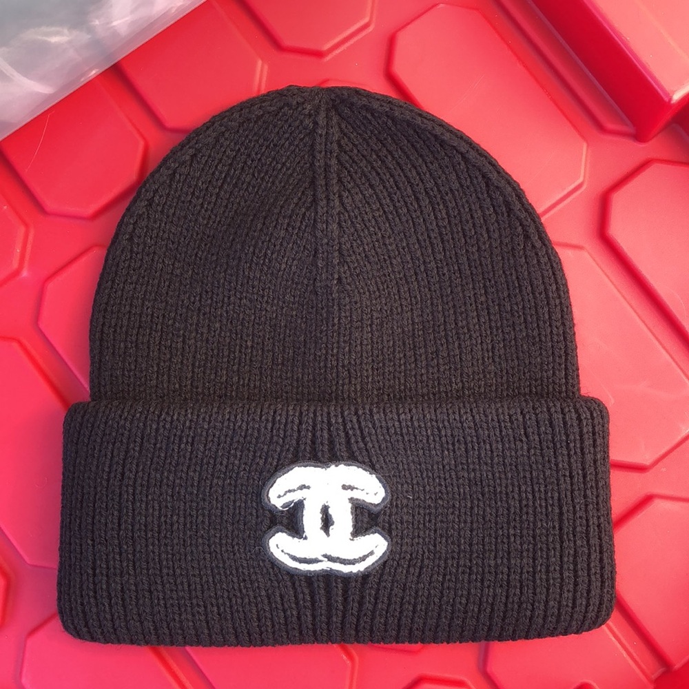 CHANEL Black Ribbed Beanie with White Logo